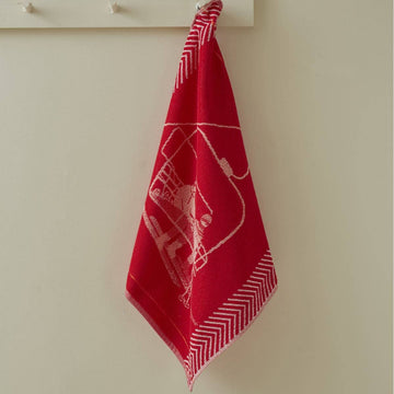 RØD SKILIFT Gæstehåndklæde 50x50 cm. Design med en rød bund med et lyst skiliftmotiv og grafiske kanter.