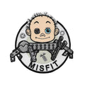 MISFIT Strygemærke, en dukke med mekaniske ben og teksten MISFIT