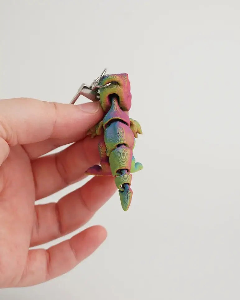 BABY T-REX Antistress Nøglering regnbue fidget