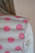 Blød varmepude til nakke og skuldre med pink smiley
