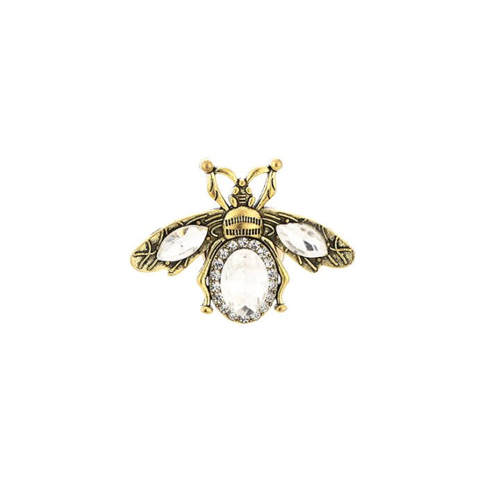 Lille metal flue detalje på cardigan