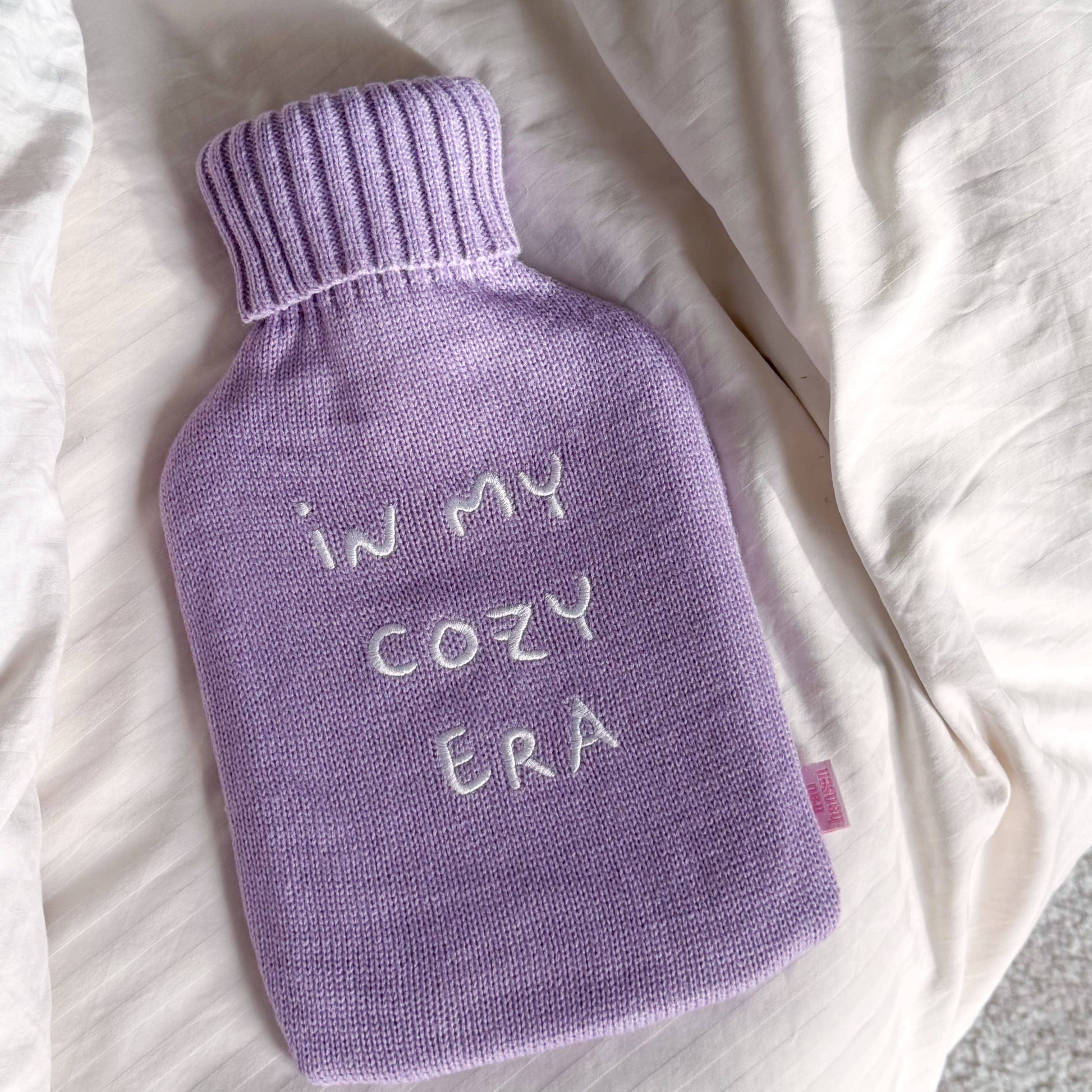 IN MY COZY ERA Varmedunk i lilla og naturgummi