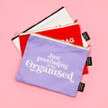 Lilla canvas makeup pouch med tekst