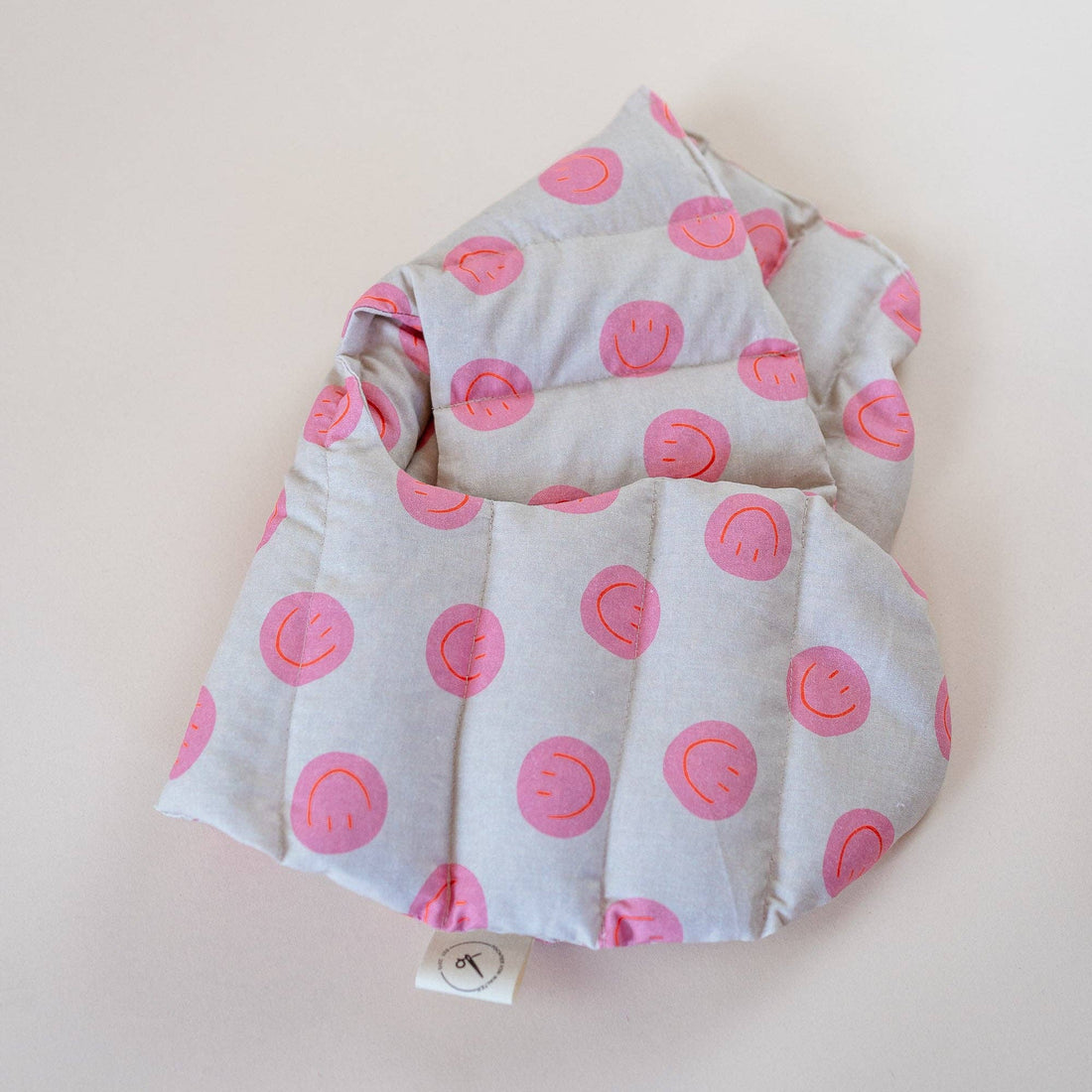 varmepude med smileys og økologisk spelt