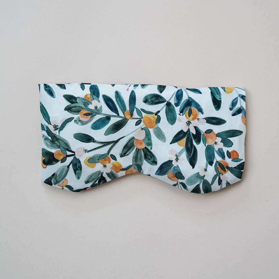 Øjenpude til savasana og afslapning i varme orange nuancer