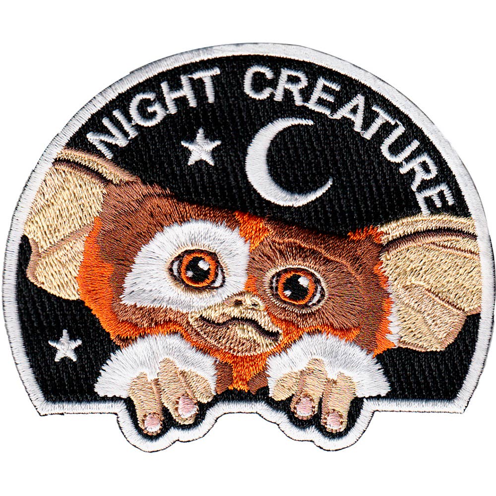 NIGHT CREATURE Gizmo Strygemærke, Gizmo, en måne og teksten NIGHT CREATURE