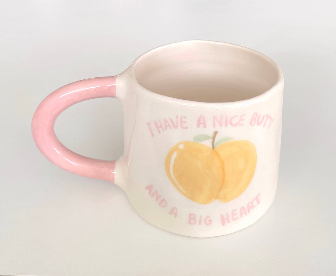 håndlavet keramik krus med ferskenmotiv