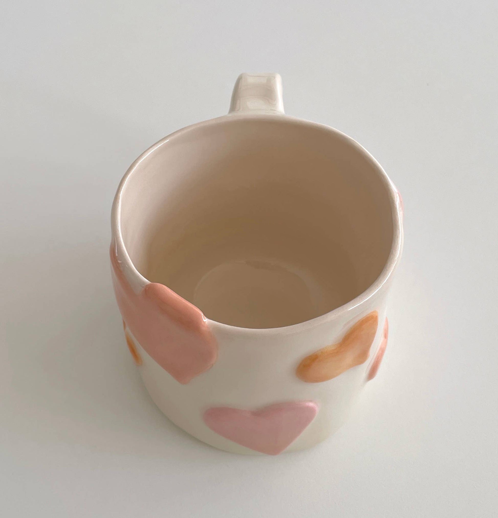 keramik krus med pink hjerter