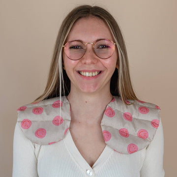 varmepude med smileys og økologisk spelt